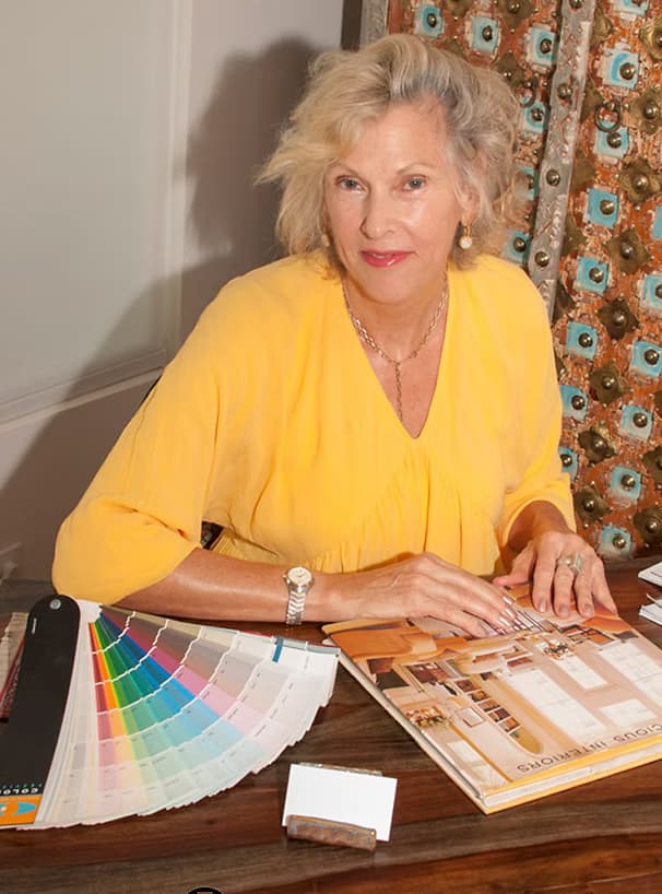 Elizabeth at her worktable, ready to hear about your project
